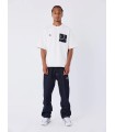 Camiseta Pxp blanca con bolsillo vaquero